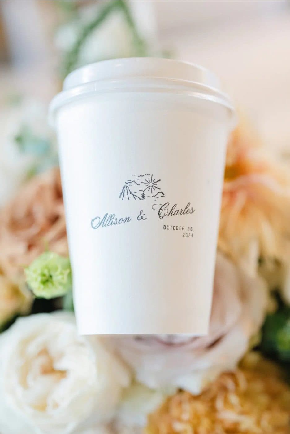 Custom-branded wedding coffee cup with the couple's names and wedding date
