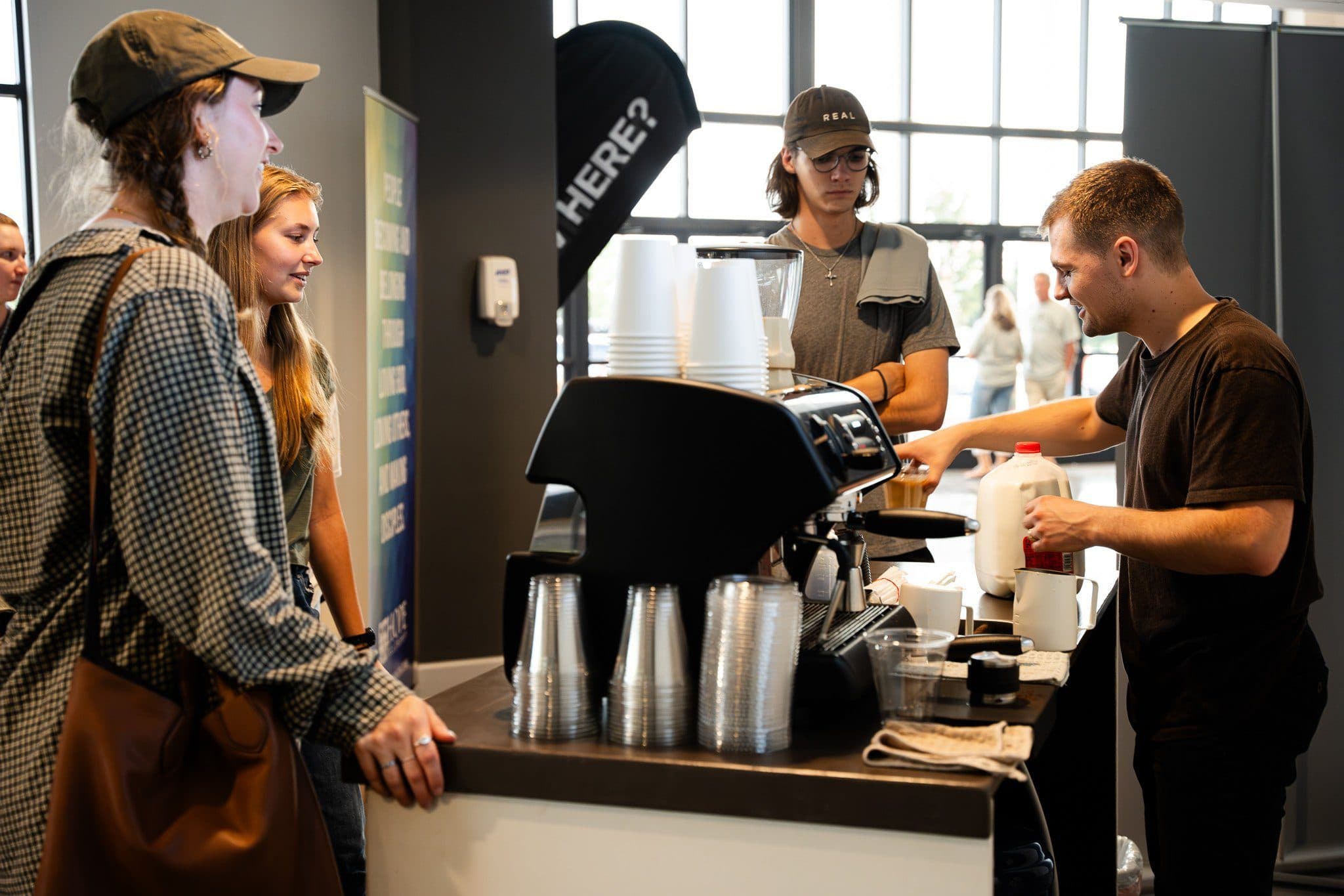 Clement Coffee baristas catering coffee for a crowd at an Atlanta event